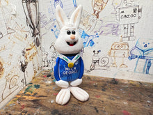 Load image into Gallery viewer, Peterborough United rabbit 2025 shirt with vertu trophy winners 2025 on the back with woolly hat