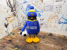 Load image into Gallery viewer, AFC Wimbledon penguin home shirt 2026/27 with football and woolly hat