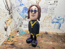 Load image into Gallery viewer, Ozzy Osbourne cartoon character with moving head