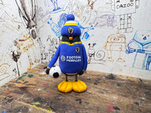 Load image into Gallery viewer, AFC Wimbledon penguin home shirt 2026/27 with football and woolly hat