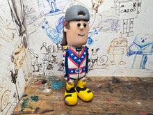 Load image into Gallery viewer, Harley Prebble cartoon character with moving head 2026