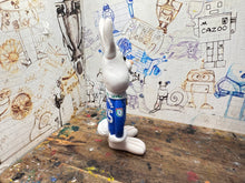 Load image into Gallery viewer, Peterborough United rabbit 2025 shirt with vertu trophy winners 2025 on the back with woolly hat