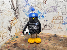 Load image into Gallery viewer, Peterborough United goalkeeper penguin 2023/2024 with football and woolly hat (black)