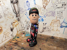 Load image into Gallery viewer, Kyle ryde cartoon character with moving head 2025
