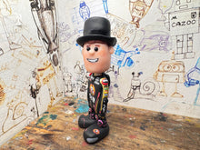 Load image into Gallery viewer, Storm Stacey cartoon character with moving head 2025