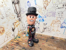 Load image into Gallery viewer, Storm Stacey cartoon character with moving head 2025