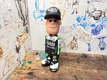 Load image into Gallery viewer, christian iddon cartoon character with moving head 2025