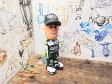 Load image into Gallery viewer, christian iddon cartoon character with moving head 2025