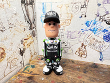 Load image into Gallery viewer, christian iddon cartoon character with moving head 2025