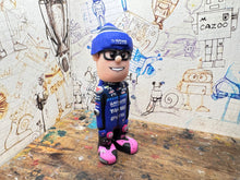 Load image into Gallery viewer, Brad Ray cartoon character with moving head 2025