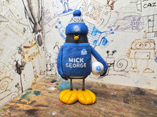 Load image into Gallery viewer, Peterborough United goalkeeper penguin 2025/2026 with football and woolly hat (blue)