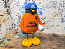 Load image into Gallery viewer, Peterborough United goalkeeper penguin 2024/25 with football and woolly hat (orange)
