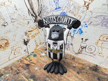 Load image into Gallery viewer, Notts County magpie home 2025/26 kit with scarf and medal and on the back league two play-off winners 2026
