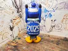 Load image into Gallery viewer, Peterborough United penguin 2025 shirt with vertu trophy winners 2025 on the back with woolly hat
