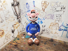 Load image into Gallery viewer, Peterborough United Wallace with football boots
