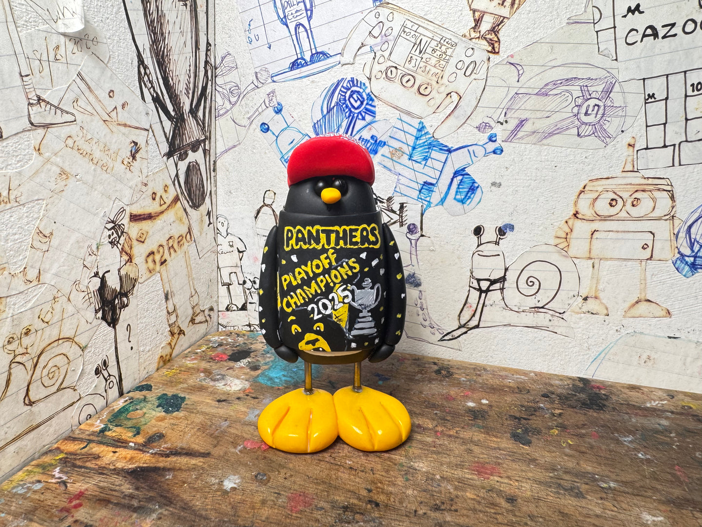 Nottingham Panthers playoff champions 2025 penguin with cap