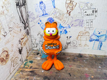 Load image into Gallery viewer, Garfield in his Sheffield Steelers Hoody
