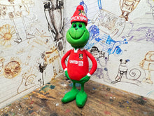 Load image into Gallery viewer, The Grinch in his wrexham shirt and woolly hat
