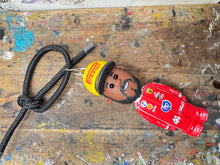 Load image into Gallery viewer, Lewis Hamilton cartoon character car mirror keyring
