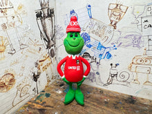 Load image into Gallery viewer, The Grinch in his wrexham shirt and woolly hat
