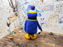 Load image into Gallery viewer, AFC Wimbledon penguin home shirt 2026/27 with football and woolly hat
