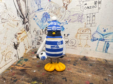 Load image into Gallery viewer, Queens Park Rangers penguin 2026/27 with football and woolly hat
