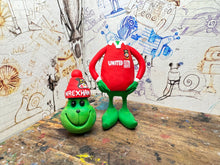 Load image into Gallery viewer, The Grinch in his wrexham shirt and woolly hat
