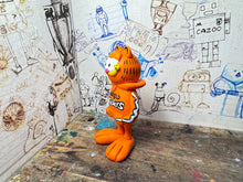 Load image into Gallery viewer, Garfield in his Sheffield Steelers Hoody
