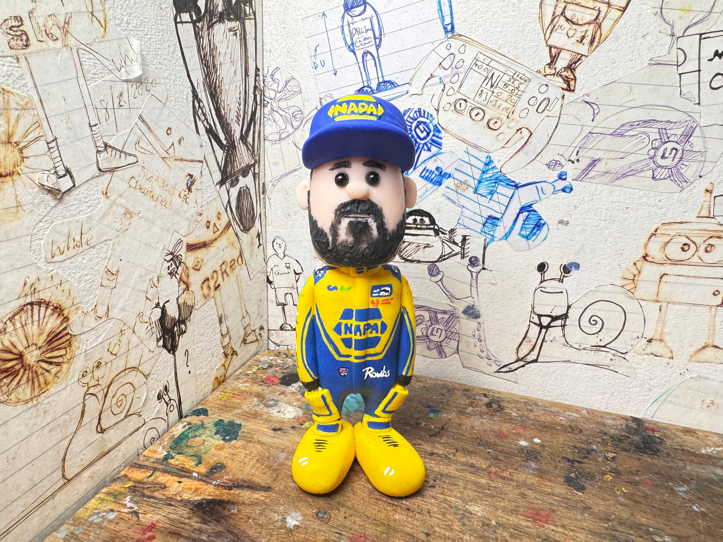 Btcc napa racing race driver Daniel Rowbottom with magnetised heads 2025 (cartoon character)
