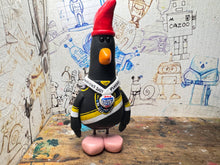 Load image into Gallery viewer, Nottingham Panthers playoff champions 2025 penguin with with medal and elite playoff champions 2025 on the back
