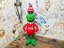 Load image into Gallery viewer, The Grinch in his wrexham shirt and woolly hat
