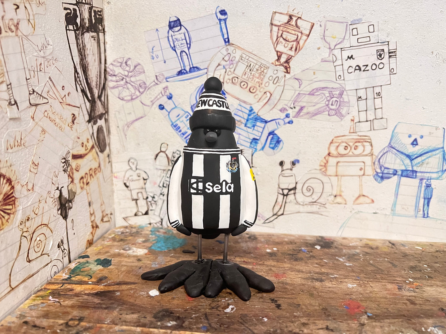 Newcastle United magpie 2024 kit with woolly hat