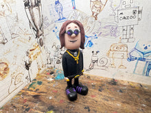 Load image into Gallery viewer, Ozzy Osbourne cartoon character with moving head
