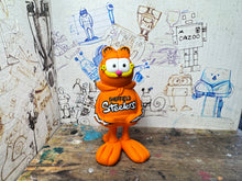 Load image into Gallery viewer, Garfield in his Sheffield Steelers Hoody
