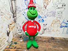 Load image into Gallery viewer, The Grinch in his wrexham shirt and woolly hat
