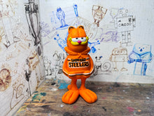 Load image into Gallery viewer, Garfield in his Sheffield Steelers Hoody
