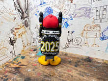 Load image into Gallery viewer, Nottingham Panthers playoff champions 2025 penguin with with medal and elite playoff champions 2025 on the back
