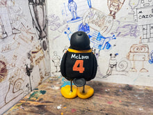 Load image into Gallery viewer, Lando Norris f1 Penguin 2023 (black) with podium cap
