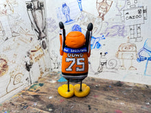 Load image into Gallery viewer, Sheffield Steelers Penguin home jersey with elite league champions 2024 medal / celebrating penguin with dowd 75 on the back
