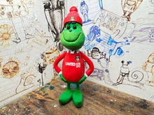 Load image into Gallery viewer, The Grinch in his wrexham shirt and woolly hat
