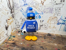 Load image into Gallery viewer, Peterborough United penguin 2026/27 with football and woolly hat
