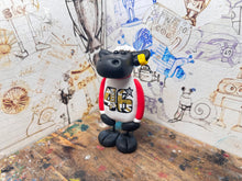 Load image into Gallery viewer, Tommy Bridewell sheep with 46 at the front
