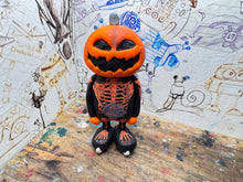 Load image into Gallery viewer, Sheffield Steelers pumpkin man with ice hockey boots
