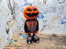 Load image into Gallery viewer, Sheffield Steelers pumpkin man with ice hockey boots
