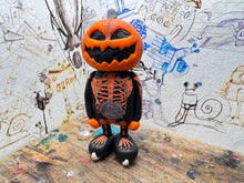 Load image into Gallery viewer, Sheffield Steelers pumpkin man with ice hockey boots

