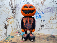 Load image into Gallery viewer, Sheffield Steelers pumpkin man with ice hockey boots
