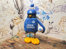 Load image into Gallery viewer, Peterborough United goalkeeper penguin 2025/2026 with football and woolly hat (blue)
