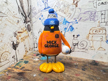 Load image into Gallery viewer, Peterborough United goalkeeper penguin 2024/25 with football and woolly hat (orange)
