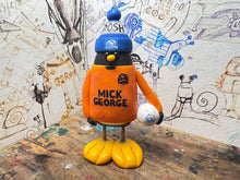 Load image into Gallery viewer, Peterborough United goalkeeper penguin 2024/25 with football and woolly hat (orange)
