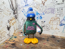 Load image into Gallery viewer, Peterborough United goalkeeper penguin 2025/2026 with football and woolly hat (green)
